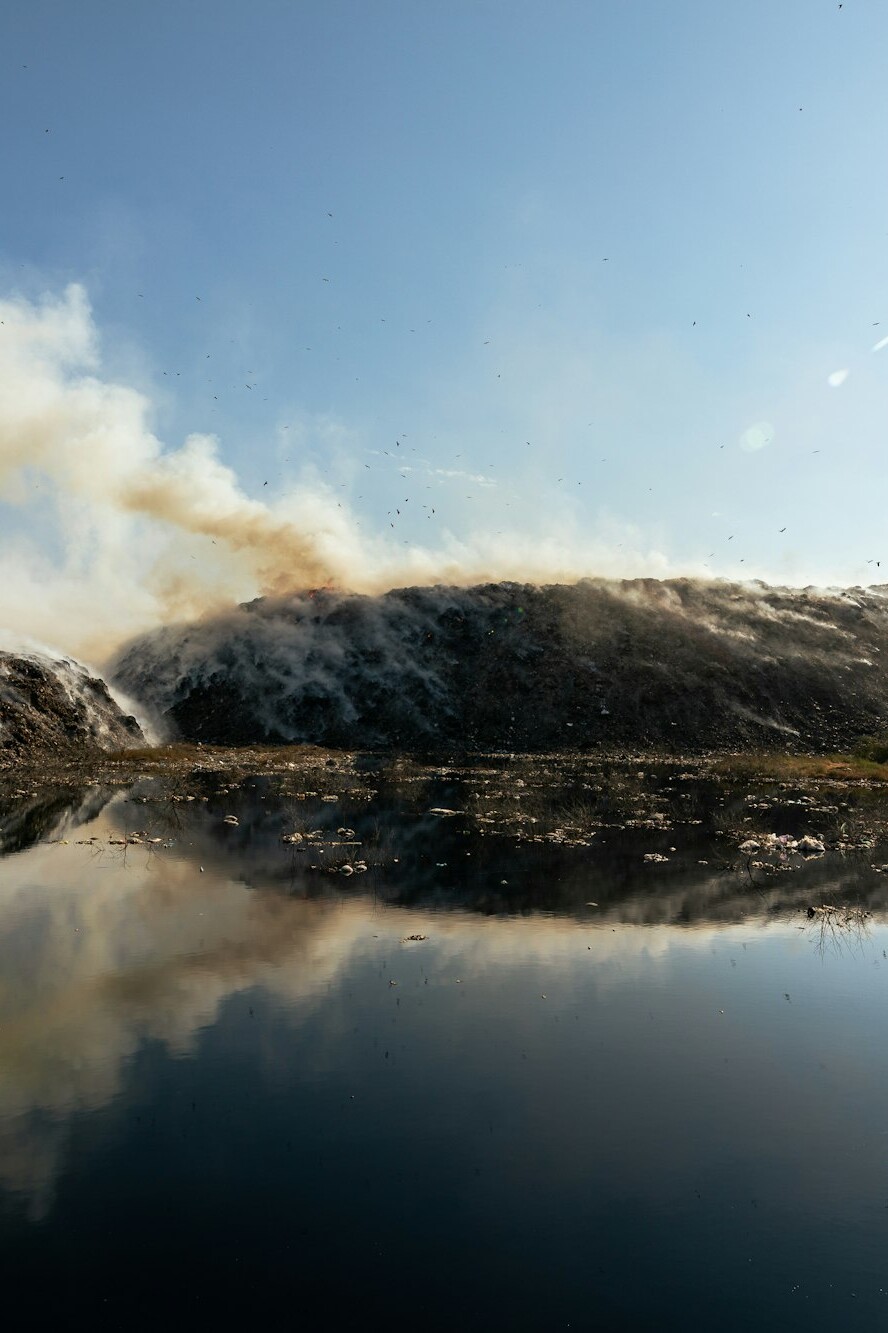 Landfill with burning trash piles