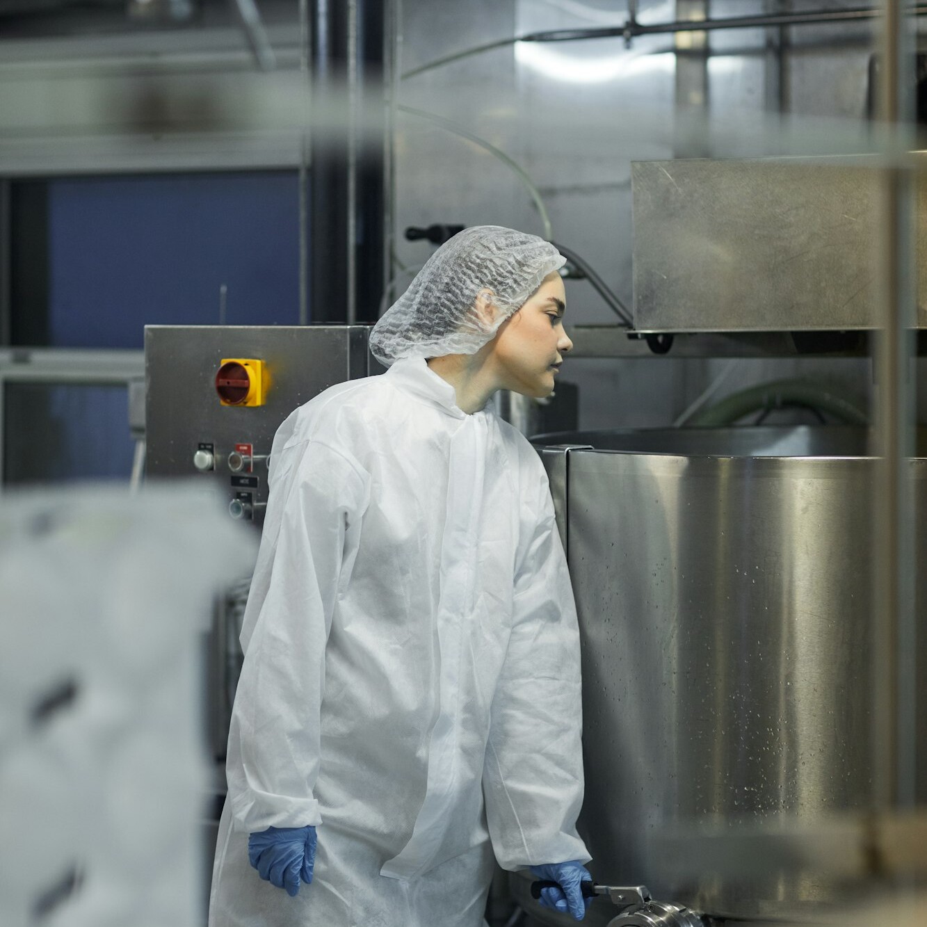 Young Woman Working at Factory